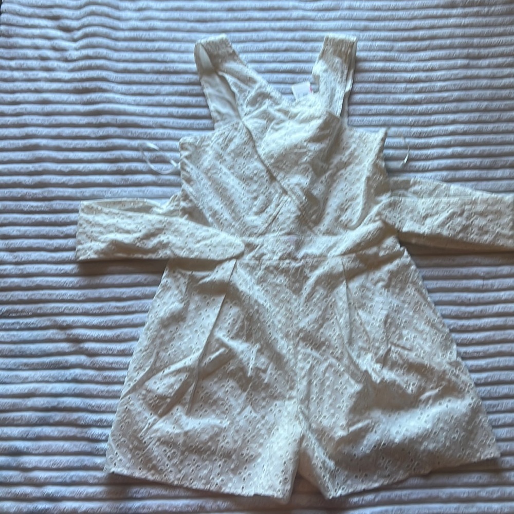 White romper with flower details